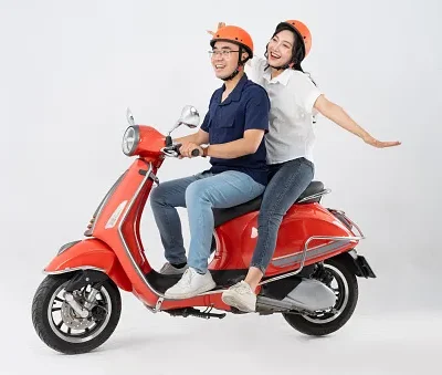 image of asian couple riding scooter on white background