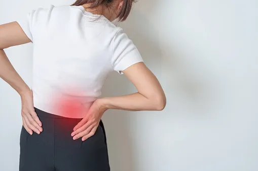 what causes lower back pain in females